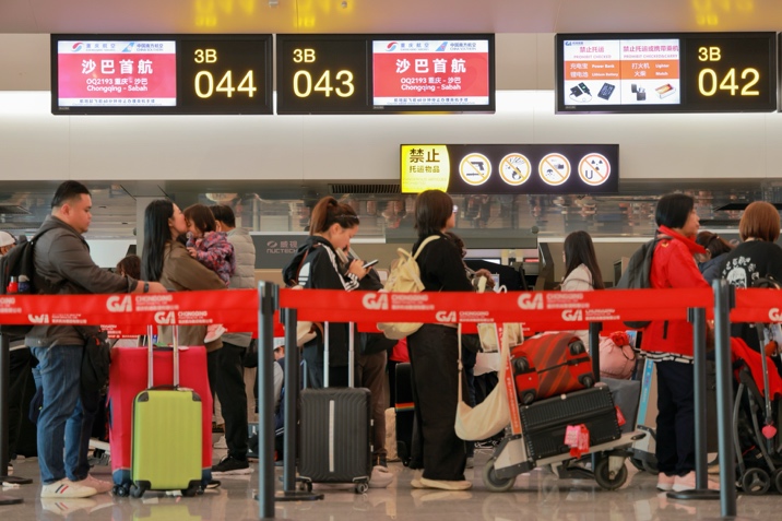 重庆航空重庆—沙巴国际航线开通。朱虹摄